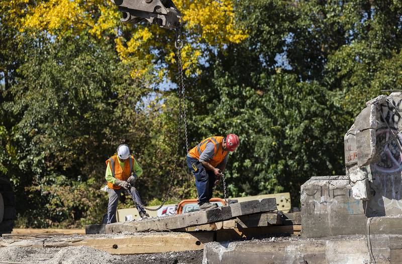 A demo crew works on moving an equipment platform Tuesday, Sept. 16, 2025, in Nelson. The platforms were put into place to protect the rails while demolition of the coal tower takes place.