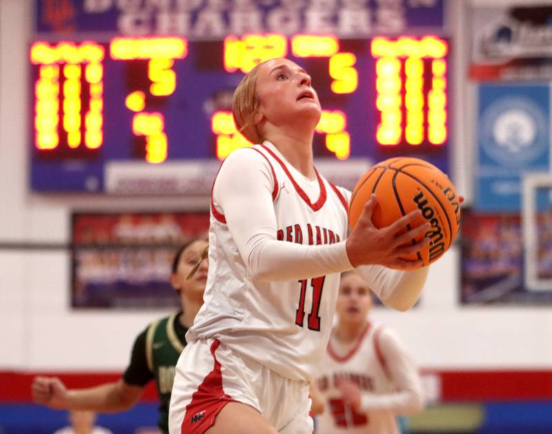 Huntley’s Anna Campanelli moves under the hoop against Rockford Boylan during varsity girls basketball on Friday, Nov. 22, 2024 at Dundee-Crown High School in Carpentersville.