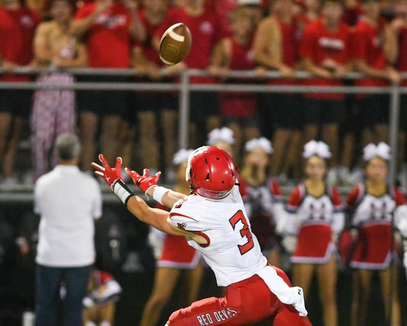 Hinsdale Central's Jack Lesniewicz (3) comes up short with the ball during the game against Downers Grove North on Friday Sept. 12, 2025, held at Downers Grove North High School.
