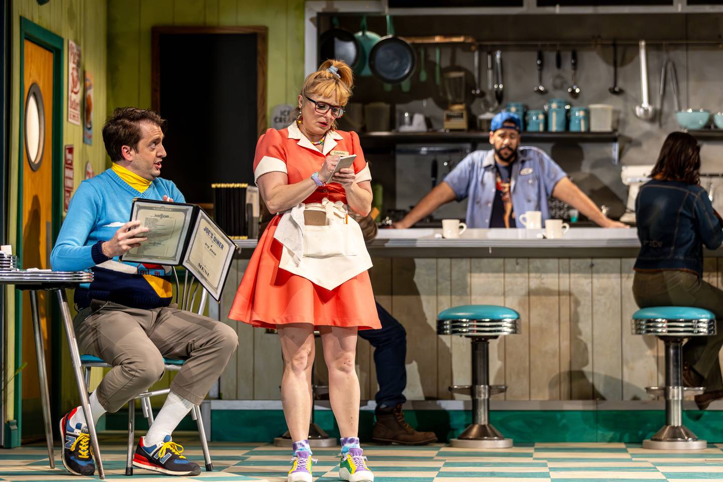 Kelly Felthous (right) plays Dawn and Jackson Evans is Ogie, Dawn’s ardent suitor, in Paramount Theatre’s Waitress. Paramount’s is the first Chicago-area production of this hit Broadway musical, with music and lyrics by Grammy winner and Tony nominee Sara Bareilles, directed by Katie Spelman. Performances run through March 30, 2025. For tickets, visit paramountaurora.com or call (630) 896-6666. Photo credit: Brett Beiner Photography
