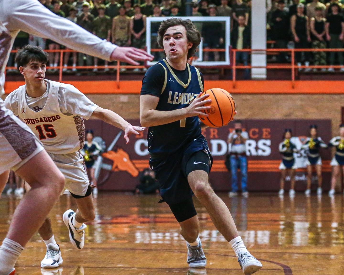 Lemont's Zane Schneider (1) drives to the basket during their Class 3A Brother Rice Sectional final basketball game between Lemont at Brother Rice. March 7, 2025 in Chicago.