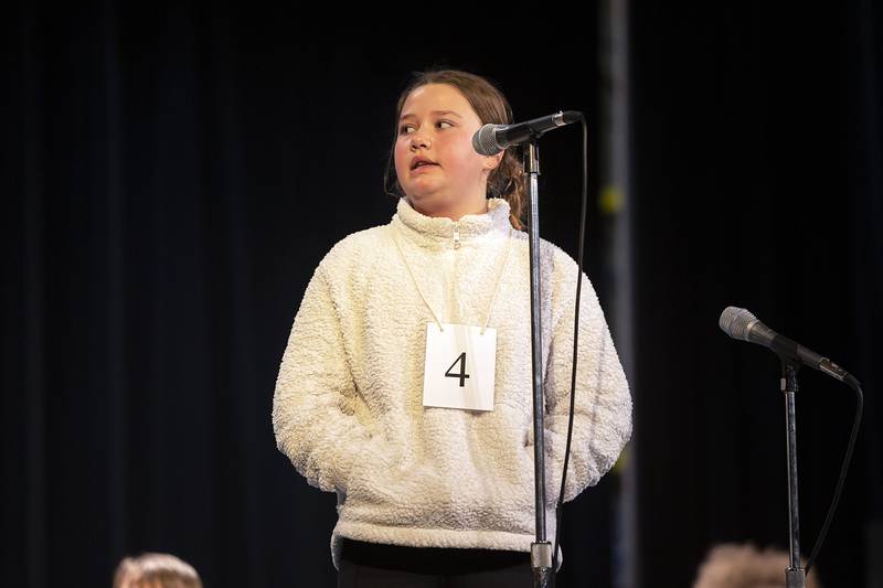 Tilton Elementary fifth grader Sydney Burke appears on stage Thursday, March 9, 2023 during the Lee-Ogle-Whiteside Regional Spelling Bee.