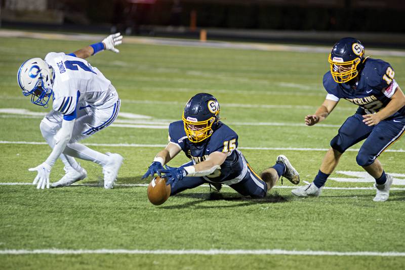 Sterling's Carter Ryan pounces on a fumble Friday, Oct. 01, 2021 in the first half against Quincy.