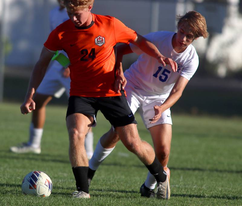 Burlington Central’s Oleksii Sergyeyev, right, battles Crystal Lake Central’s  Gavin Kane in varsity soccer on Thursday Sept. 26, 2024, at Crystal Lake Central High School in Crystal Lake.