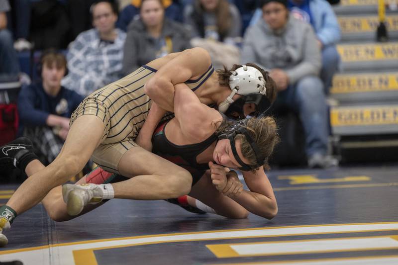 Sterling’s Karson Strohmayer (top) wins the third place match against Rylynd Rynkewicz of Lasalle-Peru at 126 pounds in the Sterling wrestling regional.