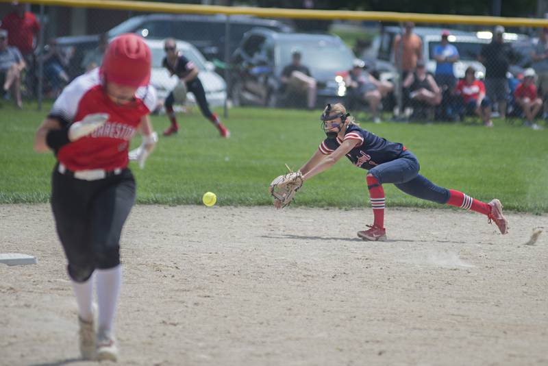 West Central’s Brynna Seitz dives but comes up short against Forreston Monday, May 30, 2022. The hit put Forreston’s first two runs on the board.