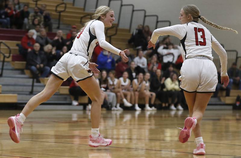 Huntley's Anna Campanelli celebrates a basket with her teammate, Morgan McCaughn, during a Dundee-Crown Thanksgiving Girls Basketball Tournament basketball game Wednesday, Nov.. 16, 2022, between Huntley and Boylan at Huntley High School.