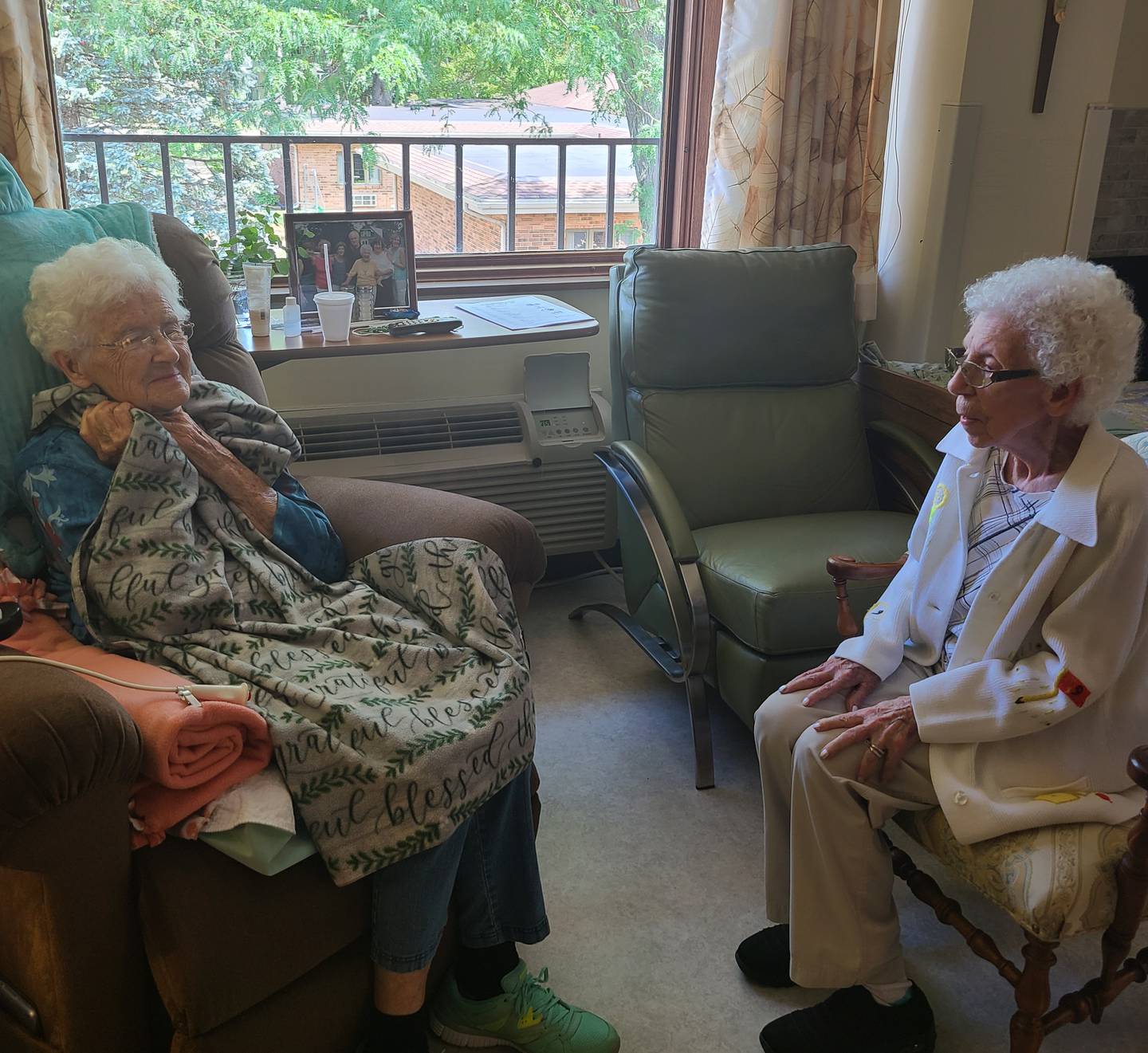 Alberta, left, turned 102 on Aug. 16; Belle just turned 97.