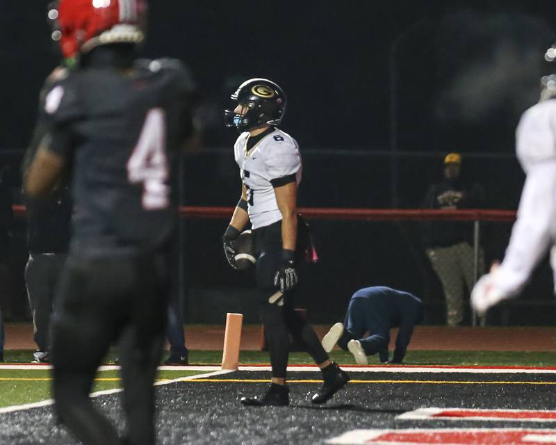 Glenbard North's Tyler Hvorcik (6) looks towards the sidelines after catching a touchdown during Class 7A first round football game between Glenbard North at Yorkville. Friday, Oct 31, 2025 in Yorkville.