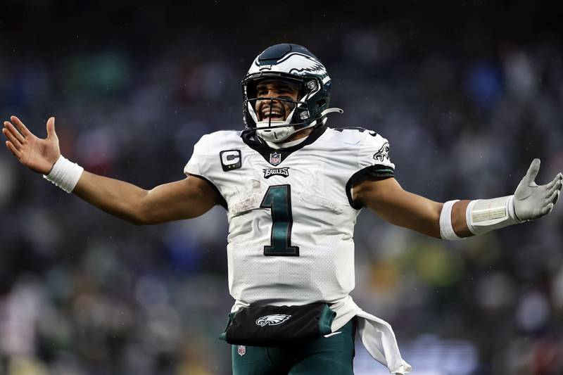 Philadelphia Eagles quarterback Jalen Hurts reacts after a touchdown against the New York Giants on Sunday, Dec. 11, 2022, in East Rutherford, N.J.