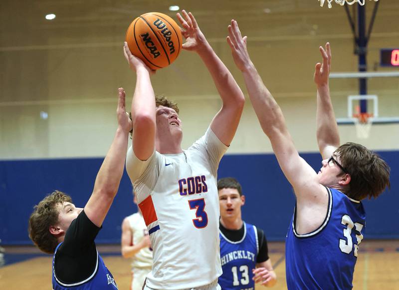 Genoa-Kingston's Jack Peterson shoots over Hinckley-Big Rock's Marshall Ledbetter Tuesday, Jan. 6, 2026, during their game at Genoa-Kingston High School.