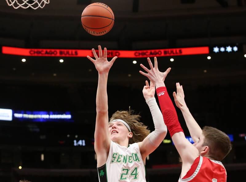 Seneca's Grant Siegel shoots a jump shot over Streator's Cade Peterson during a game on Tuesday, Dec. 21, 2023 at the United Center in Chicago.