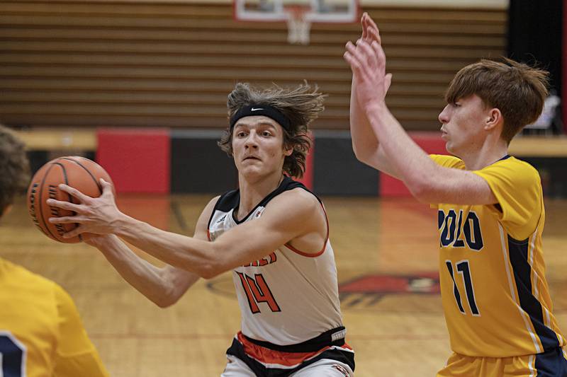 Milledgeville’s Kacen Johnson fakes a pass Monday, Dec. 19, 2022 against Polo in the Forreston Holiday Tournament.