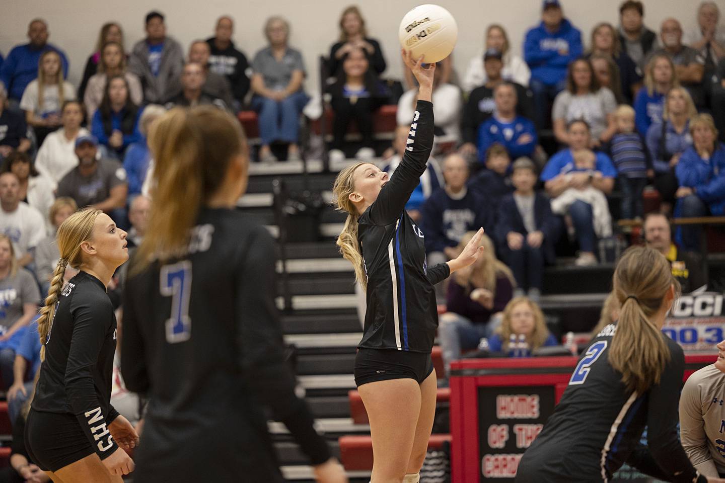 Newman’s Katie Grennan plays the ball over the net Wednesday, Nov. 2, 2022 in the sectional championship game against River Ridge.