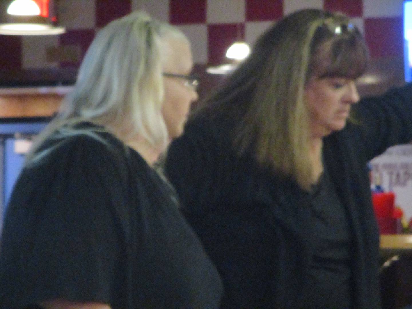 Residents Jori Gura (left) and Toni Muren led the neighborhood meeting on the Joliet Catholic Academy stadium plan held Wednesday at the Croatian Cultural Club in Joliet.
