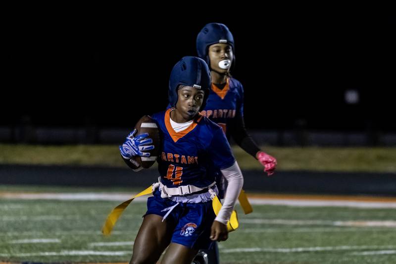 Romeoville's Daniya Warren makes a nice move during a varsity flag football Romeoville Regional semifinal game at Romeoville on Oct. 7, 2025.