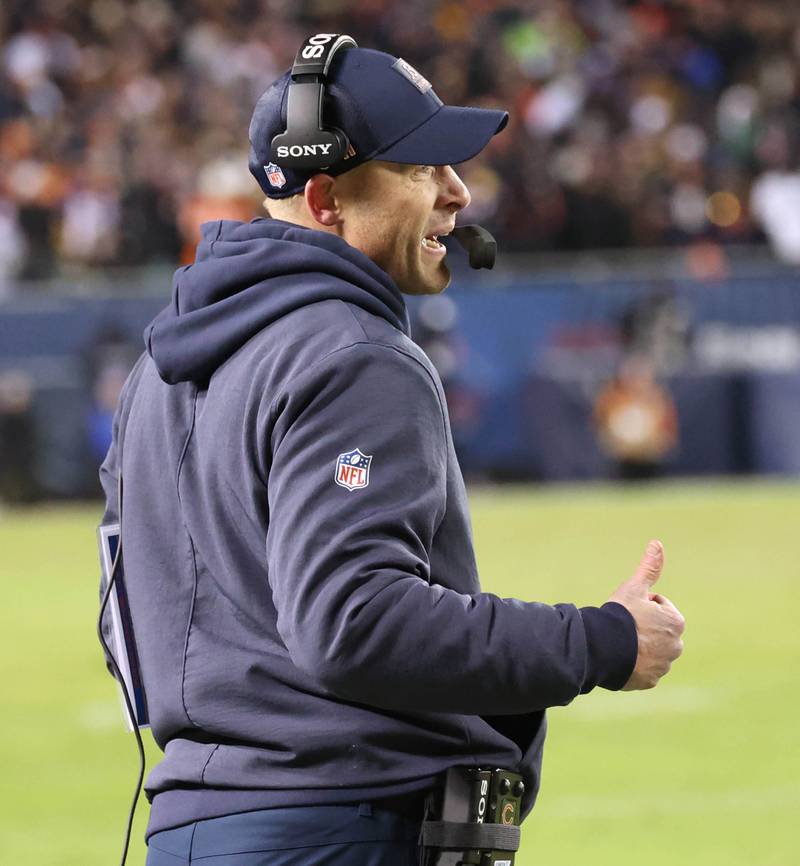 Chicago Bears head coach Ben Johnson gives a thumbs up to an official after a call during their NFL Wild Card game against the Green Bay Packers Saturday, Jan. 10, 2026, at Soldier Field in Chicago.