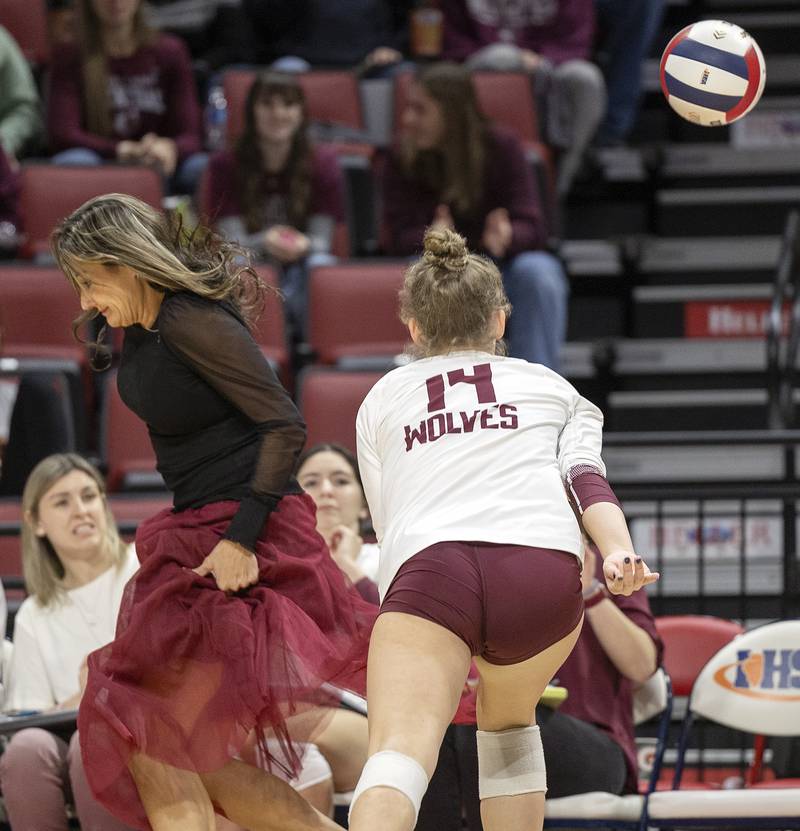 Prairie Ridge's Head Coach Hilary Agnello scampers away from a shot against DePaul College Prep Saturday, Nov. 16, 2024, in the Class 3A third place state volleyball match at CEFCU Arena in Normal.