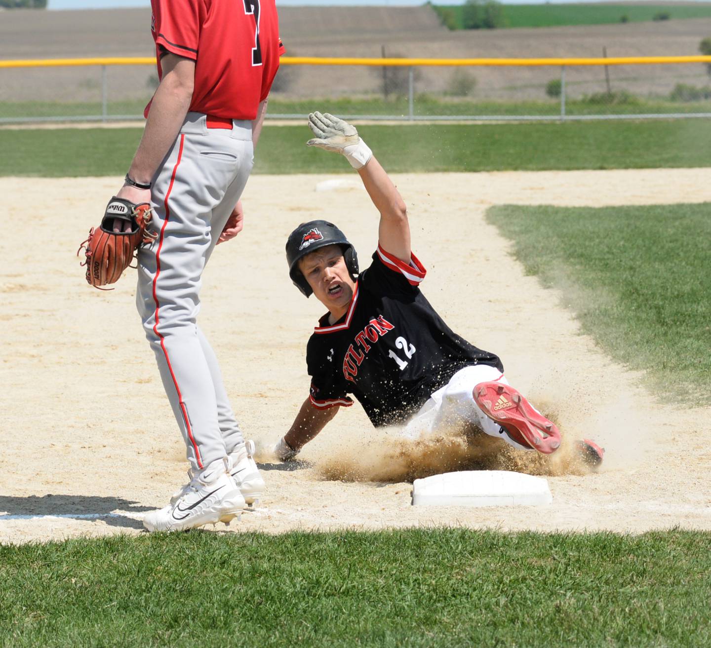 Fulton's Ryan Eads slides safely into third after hitting a triple against Forreston at the 1A Forreston Regional championship game on Saturday, May 20. The Steamers won the game 11-3 to advance to the Pearl City Sectional.