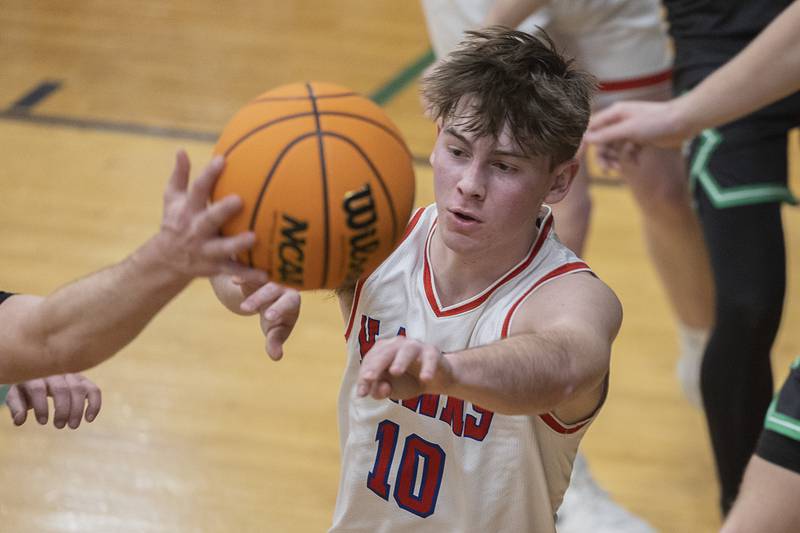 Oregon’s Keaton Salsbury makes a pass against Rock Falls Wednesday, Feb. 25, 2026, in the Class 2A regional semifinal at Rock Falls High School.