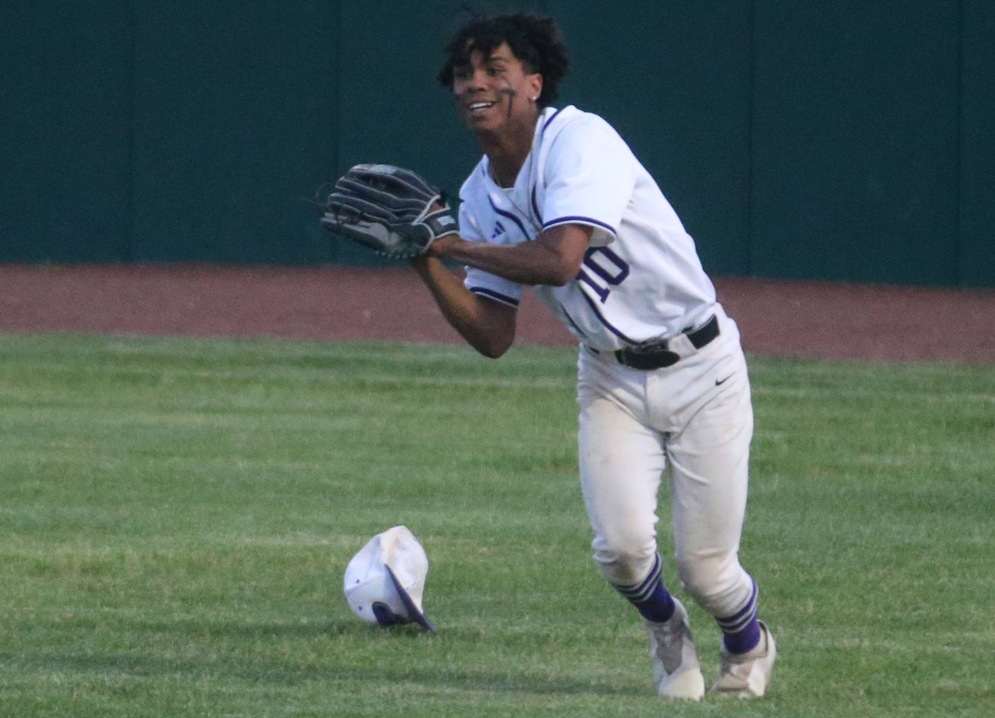 Plano's Amari Bryant makes a catch in the outfield against Ottawa during the Class 3A Regional semifinal game on Wednesday, May 22, 2024 at Huby Sarver Field in La Salle.