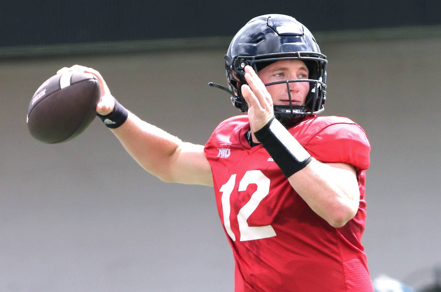 Northern Illinois Huskies quarterback Rocky Lombardi throws a pass Tuesday, Aug. 9, 2022, during practice in Huskie Stadium at NIU.