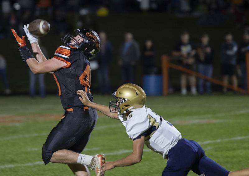 Milledgeville’s Spencer Nye has a ball slip by on a catch against Polo Friday, Oct. 4, 2024, at Milledgeville High School.