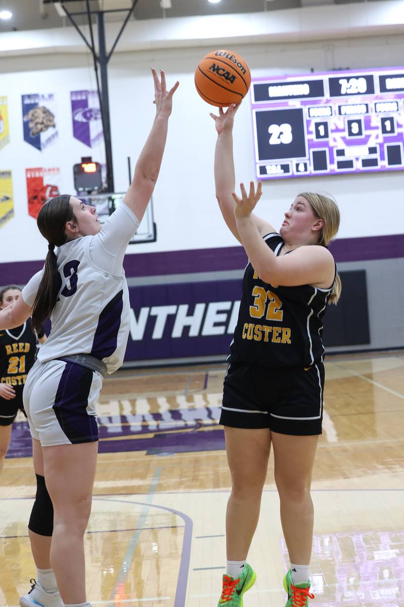 Reed-Custer's Harlie Libermann shoots under pressure from Manteno's Maddie Gesky during Reed-Custer's 45-42 victory over Manteno on Monday, Feb. 2, 2026.