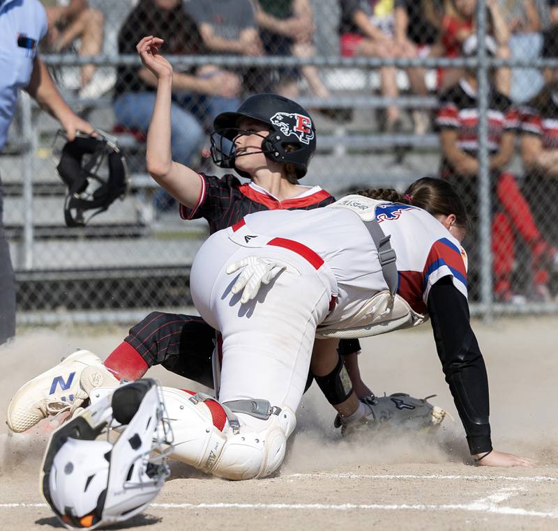 Erie-Prophetstown’s Laken Renkes slides in safe at home on a fielder’s choice for the team’s first run against Morrison Thursday, May 14, 2026.