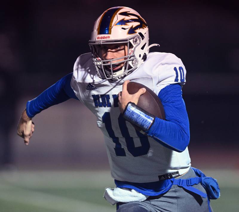 Warren’s Jack Wolf carries a kickoff return against York during a Class 8A football quarterfinal on Friday, Nov. 15, 2024 in Elmhurst.