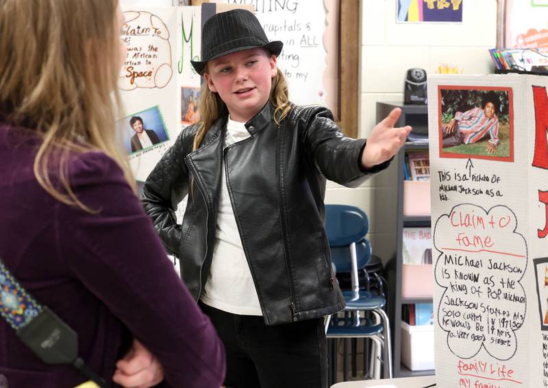 Sophia Roach, a fifth grade student at Malta Elementary School, portrays Michael Jackson Monday, March 4, 2024, during the schools Wax Museum. In honor of Black History Month students in fifth grade at the school research a Black historical figure and do a presentation on their person at the end of the month.