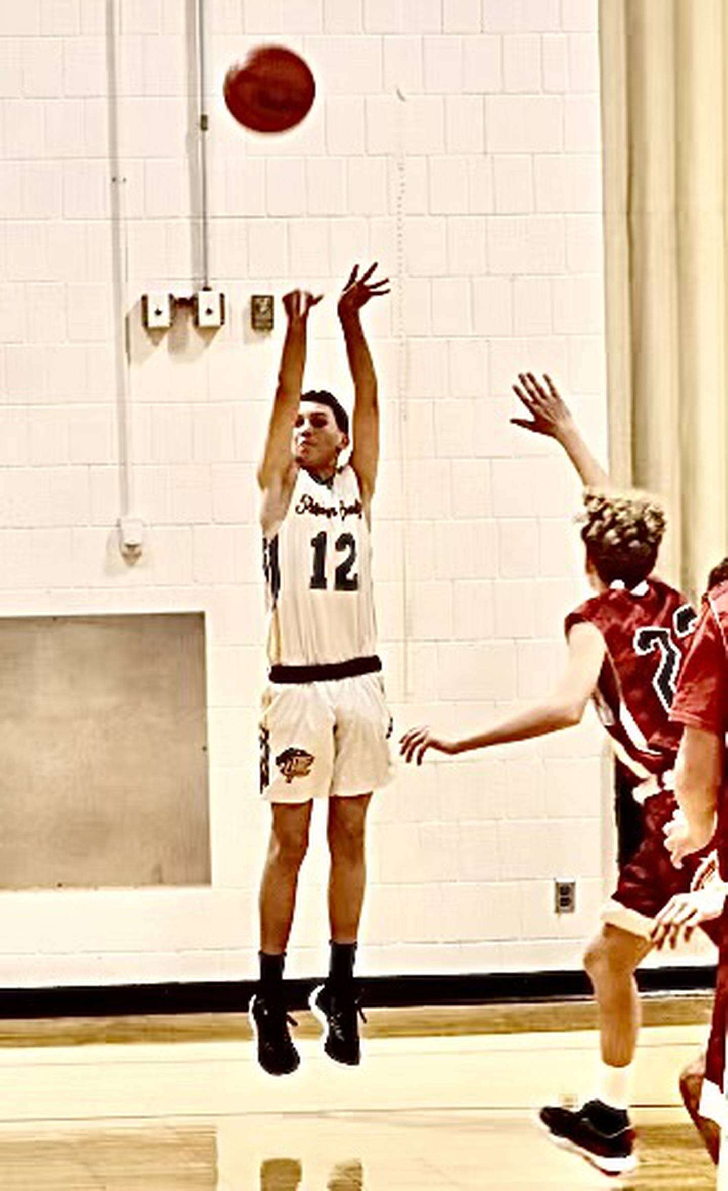 PCJH eighth-grader Tyson Zuninga fires away against Henry. The Pumas won 43-25.