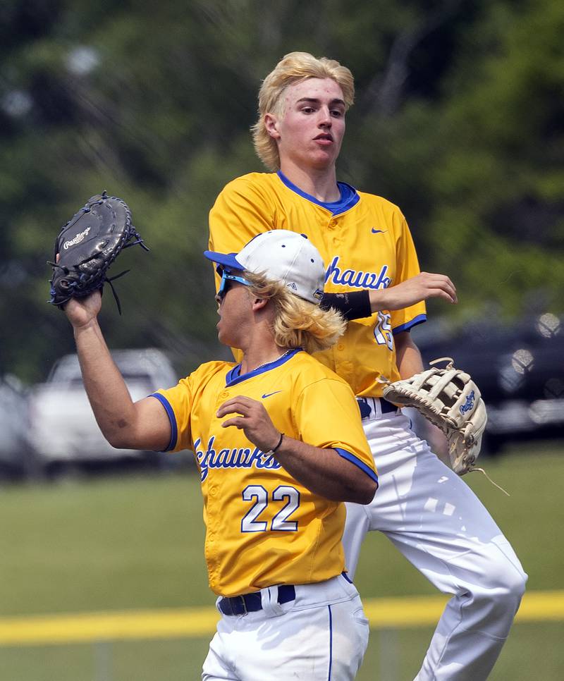 Johnsburg’s Dom Vallone makes a catch in front of Ashton Stern against Newman Saturday, May 31, 2025, in the Class 2A Sectional final in Mendota.