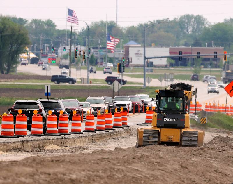 Traffic makes its way through the roadwork cones on Peace Road heading in and out of Sycamore Thursday, May 15, 2025, as construction continues on the section between Route 64 and Freed Road.