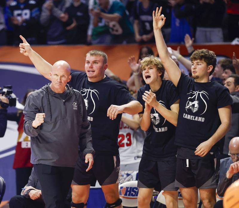 Kaneland head coach Ernie Colombe cheers on his team against Deerfield during the IHSA Class 3A boys basketball state semifinal Friday, March 13, 2026 at the State Farm Center in Champaign.