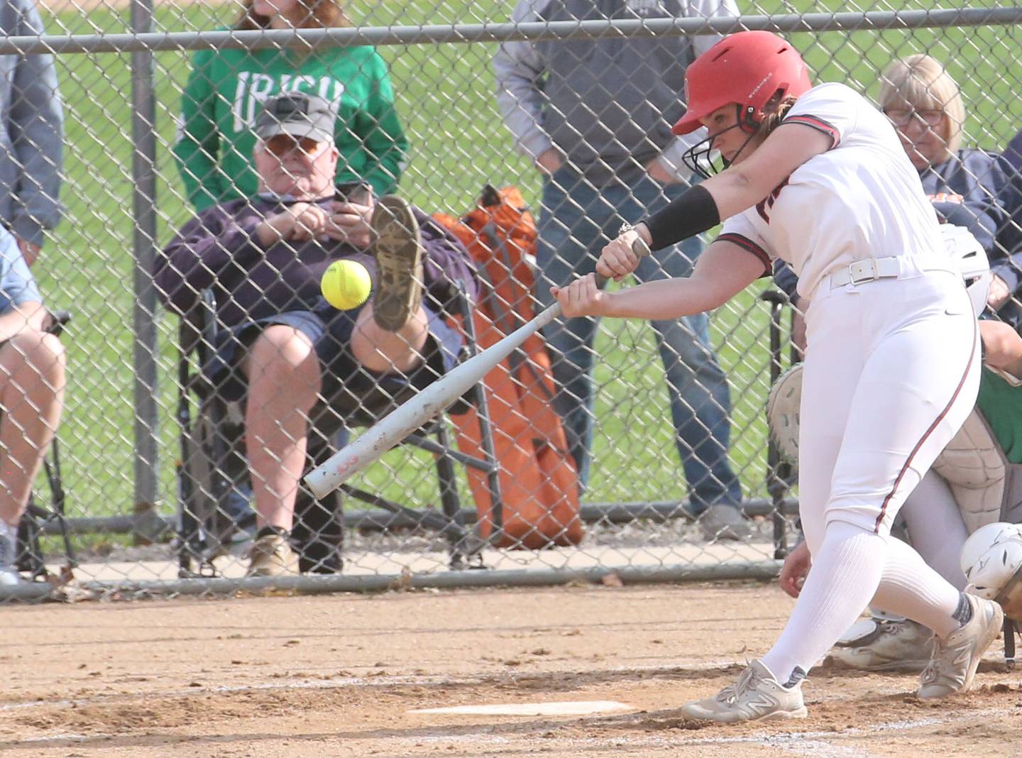 Ottawa's Bobbi Snook smacks a double against Seneca on Friday, May 2, 2025 at Ottawa High School.