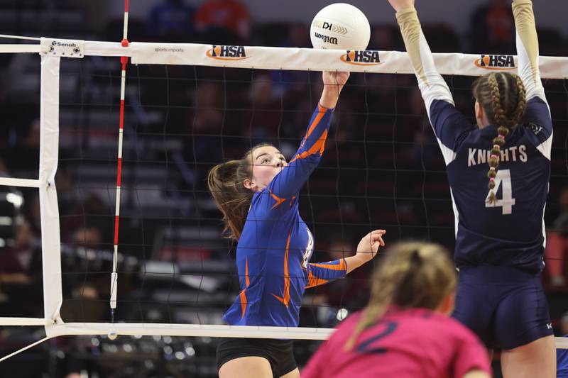 Genoa-Kingston’s Alivai Keegan pushes over a shot against IC Catholic in the Class 2A championship match on Saturday in Normal.