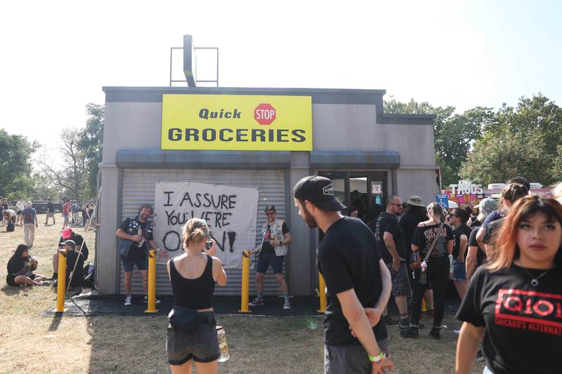 Festival goers visit the Clerks Quick Stop Groceries in Riotland at Riot Fest on Friday, Sept. 20, 2024 in Chicago.