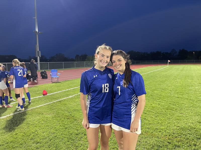 Geneva senior Julianna Drew and junior Olivia Rawls pose together following their 2-1 victory over Bartlett in the Class 3A South Elgin regional semifinal on Wednesday. Photo by Jake Bartelson.
