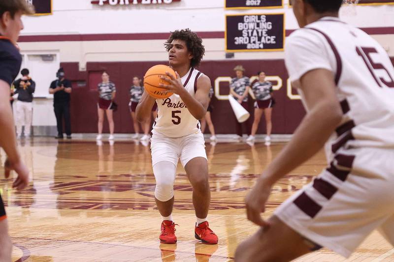 Lockport’s Nathan Munson lines up the three point shot against Lincoln-Way West on Friday, Dec. 6, 2024 in Lockport.