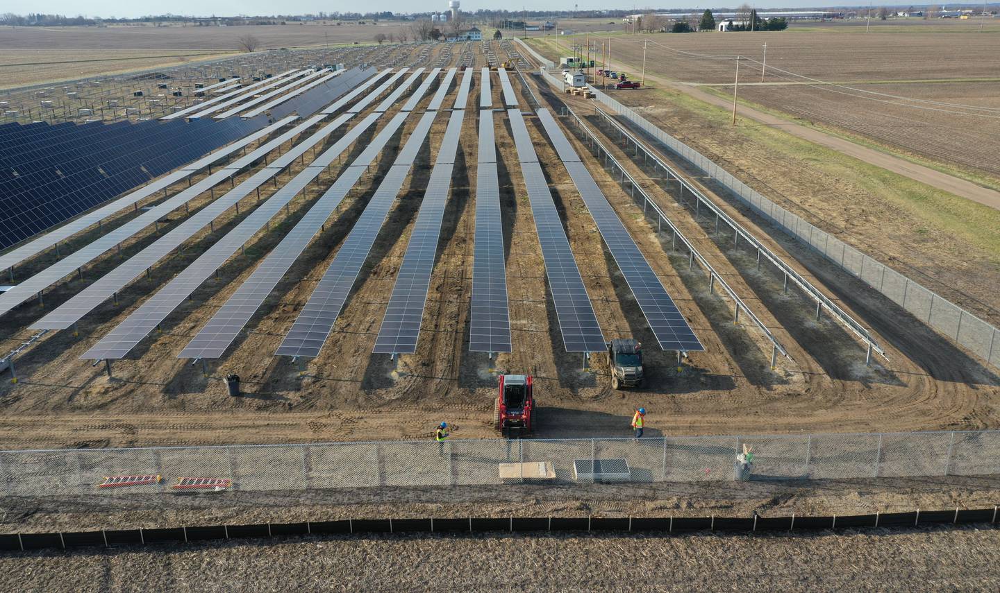 Crews build solar panels for Saliva Solar LLC near the intersection of County Road 1800 North and County Road 2100 East Street on Monday, March 30, 2026 north of Princeton. The solar farm will be a 5-megawatt commercial solar energy facility on 30 acres. When completed, it will provide enough electricity to power 1,100 homes.