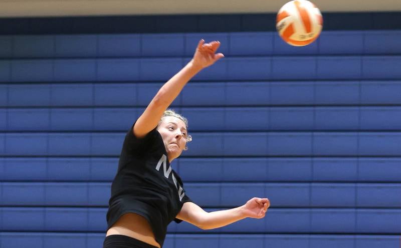 Genoa-Kingston's Alayna Pierce spikes the ball Tuesday, Aug. 23, 2022, during volleyball practice at the school in Genoa.