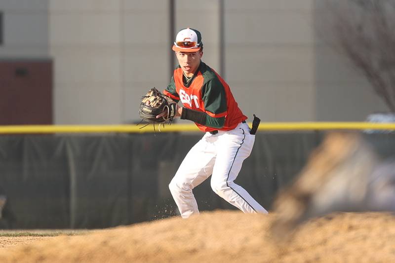Plainfield East’s Tayden Washington looks to throw to first for the out against Bolingbrook on Monday, March 27, 2023.
