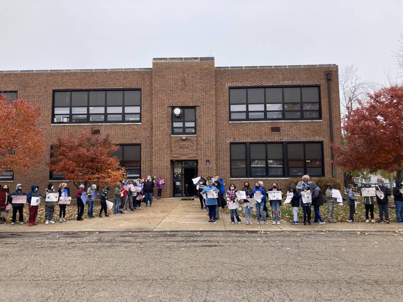 Logan  Junior High Students lined the entrance to the school on Friday to welcome veterans and their families for a Veterans Day celebration, an annual tradition at the school.