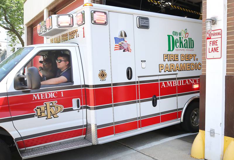 DeKalb firefighters chat in the apparatus bay Tuesday, May 16, 2023, at Fire Station 3 in DeKalb.