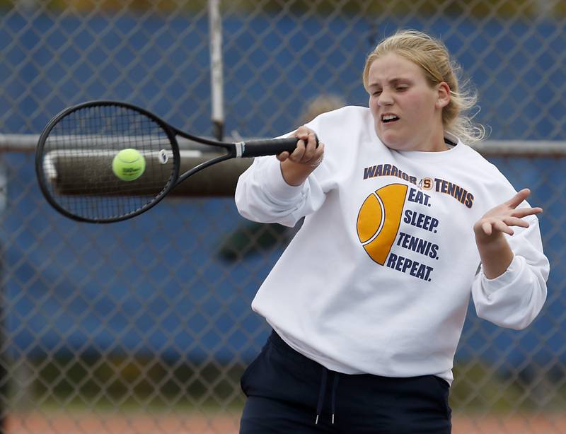Sterling’s Ellie Aitken returns the ball Thursday, Oct. 20, 2022, during during the first day of the IHSA State Girls Tennis Tournament at Hoffman Estates High School in Hoffman Estates.