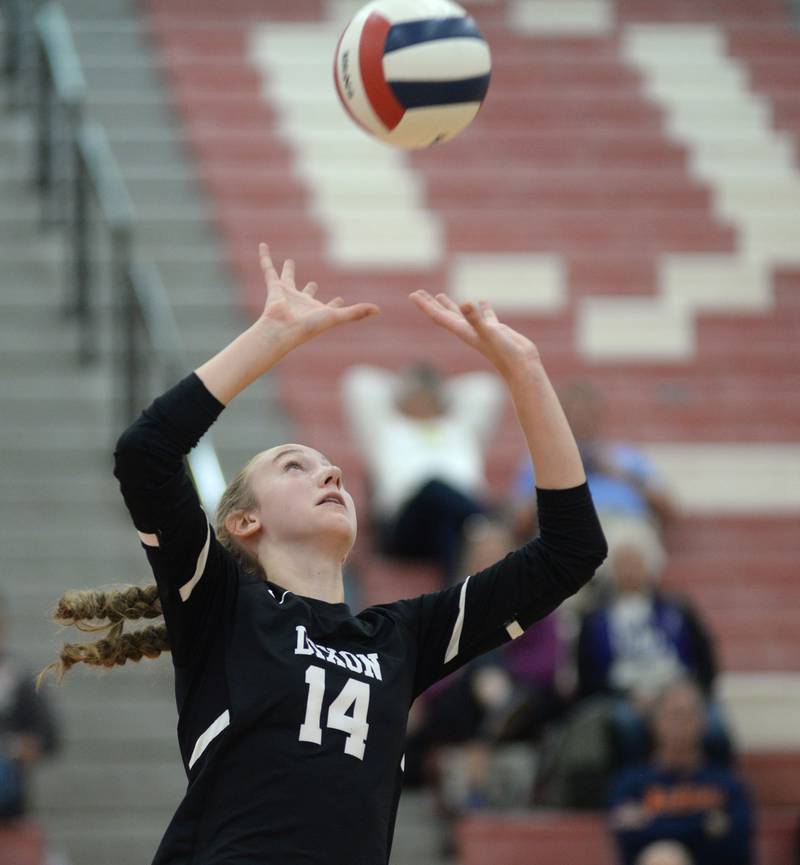Dixon's Leah Carlson sets the ball against Stockton in the championship game at the Oregon Varsity Girls Volleyball Tournament on Saturday, Sept. 6, 2025 at the Blackhawk Center in Oregon.