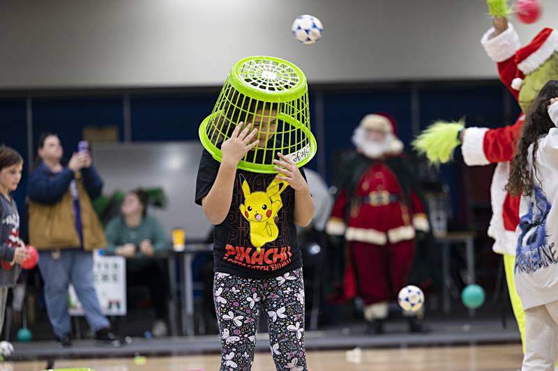 Denizens of the Grinch, aka the Rock Falls Middle School student council, puts up a fight against the kid hoard Saturday, Nov. 18, 2023 during during the dodgeball fight.