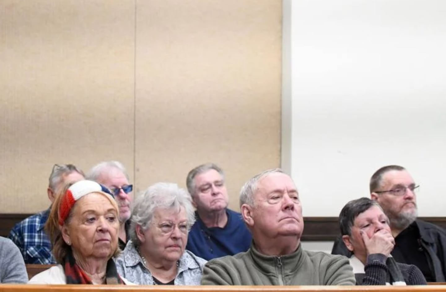 Members of the Concerned Citizens of Manteno listen to proceedings Tuesday during the hearing for its case against Gotion, the battery manufacturer opening in Manteno, at the Kankakee County Courthouse. About 25 people from the group were in attendance for the hearing.