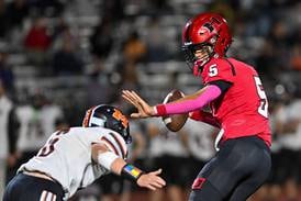 Malik Carter throws 5 TDs, Huntley tops McHenry to keep playoff hopes alive 